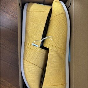 Yellow Toms slip ons NWT